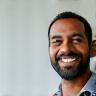 Portrait of satisfied customer Amit Patel